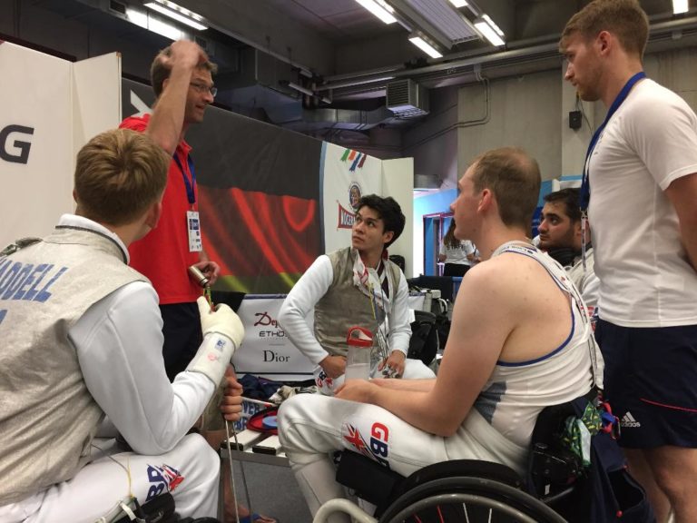 Peter Rome giving the team briefing prior to competing