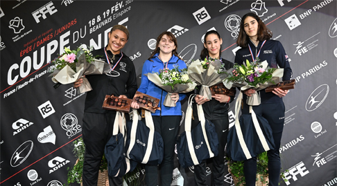 Julia Caron GBR bronze medalist and winning fencers holding flowers in Beauvais World Cup 2023