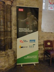 A poster showing a GB wheelchair fencer in action and noting the names of sponsors for the fundraising event