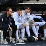 Pavel Rynes coaching men's team epee.