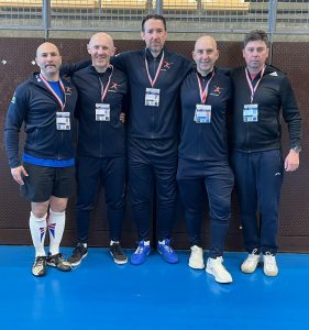 MENS SABRE team smiling at camera